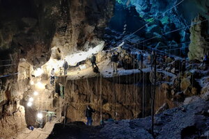  The team excavated through layers of sediments and bones that gradually washed into the cave and were left untouched for tens of thousands of years.  Photo by Fabrice Demeter